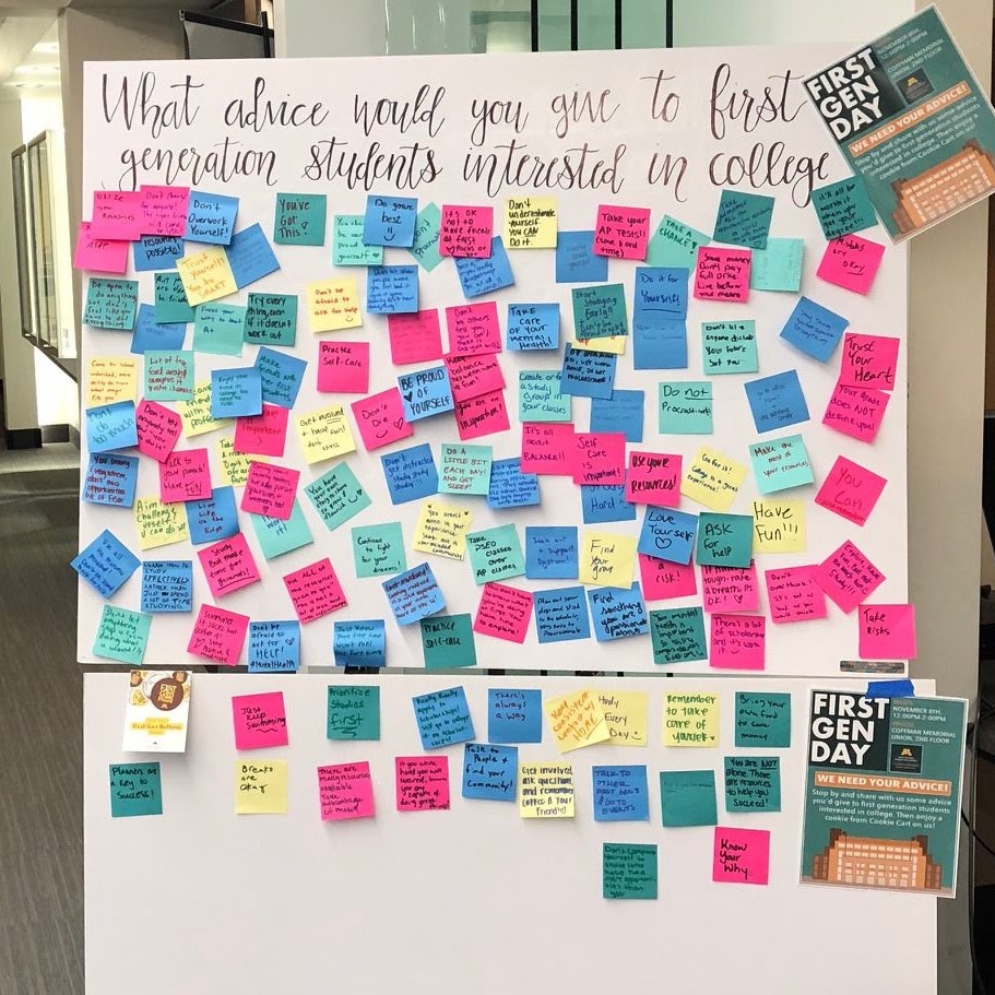 Wall filled with post-it notes with advice for first generation students on it