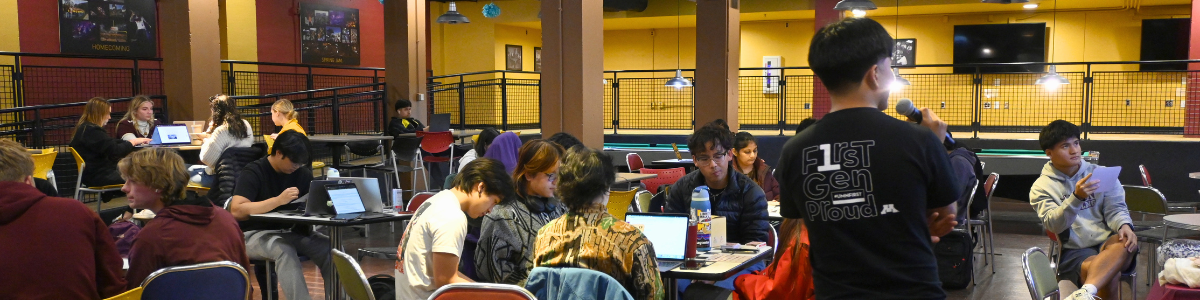 Students in Goldy's Gameroom play bingo.
